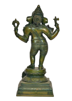 Brass Lord Ganesha statue, three-quarter front view, four arms holding objects