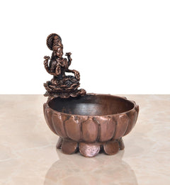 Copper Lakshmi Maa urli bowl with goddess idol, open rim and three support feet