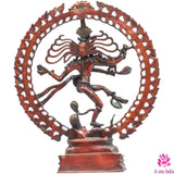 Red-brass Nataraja statue in ornate ring frame, arms spread dancing pose