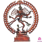 Brass Nataraja statue, front view of the dancing Shiva pose in red-brown patina ring
