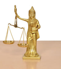 Gold-toned Lady Justice statue with scales, detailed robe and crown, raised balance arm