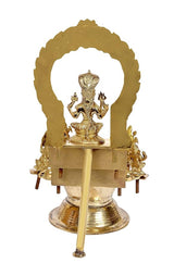 Brass Goddess Mariamma diya front view with central idol under decorative arch