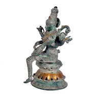 Saraswati brass sculpture with veena, seated goddess in ornate jewelry, dark green patina