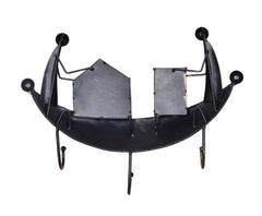 Back view: black iron boat wall key holder with hanging hooks and plates