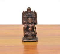 Copper Raghavendra Swami guru idol, seated figure with arched halo, front close-up.