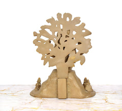 Brass Dakshinamurti Shiva statue, rear view showing tree-like halo and pedestal