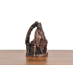 Copper Shirdi Sai Baba idol, rear-side view, arched frame and textured pedestal base