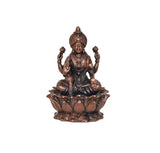 Copper Lakshmi idol, front view seated on lotus, ornate crown and garland details