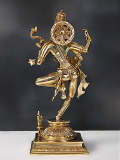 Gold-tone brass Saraswati dancing figurine, detailed circular head ornament and arms.