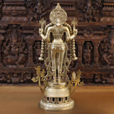 Brass Vishnu idol, back view with circular halo and trident-like staffs around
