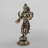 Brass Saraswati standing sculpture with veena, detailed jewelry and draped cloth