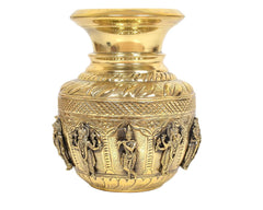 Brass kalash showpiece with detailed deity figures and ornate engraved body band