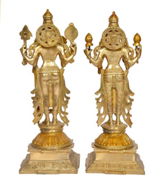 Brass Lakshmi and Vishnu statue pair, back view with ornament details, 15-inch bases