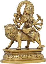 Brass Durga statue riding lion, detailed jewelry, weapons in extended hands