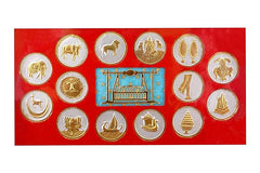 Metal Mahaveer Swami set of gold and silver circular medallions with blue banner