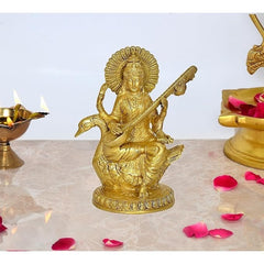 Golden brass Saraswati idol on swan base, 8.5 in tall