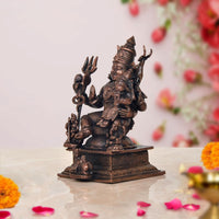 Copper Shiv Parivar showpiece statue, side view of seated Shiva holding trident