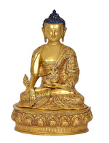 Seated Buddha statue idol, gold-tone body with blue crown and detailed robes on pedestal