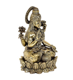 Brass Lakshmi statue idol, profile view with raised flower hands, gold-tone, 5-inch