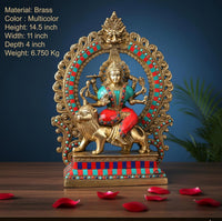 Durga Maa brass statue with painted details, seated arms, and lion mount on base