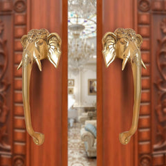 Brass Ganesha face door handle pair, two handles with elephant-head motifs, golden finish