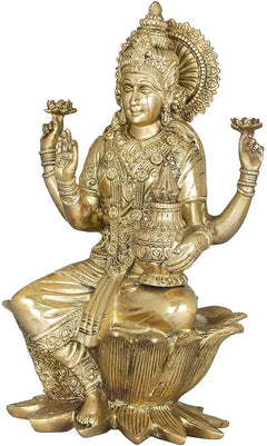 Front view brass Lakshmi idol statue seated on lotus, detailed ornaments and calm face