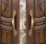Brass door pull handle pair, ornate leaf escutcheons, golden finish