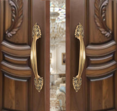 Brass door pull handle pair, ornate leaf escutcheons, golden finish