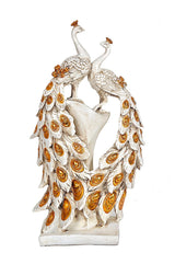 Resin peacock pair figurine in white with gold oval feather accents, raised on base