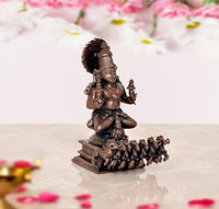 Copper Surya Dev Rath statue, angled view, arm raised, textured seven-horse base