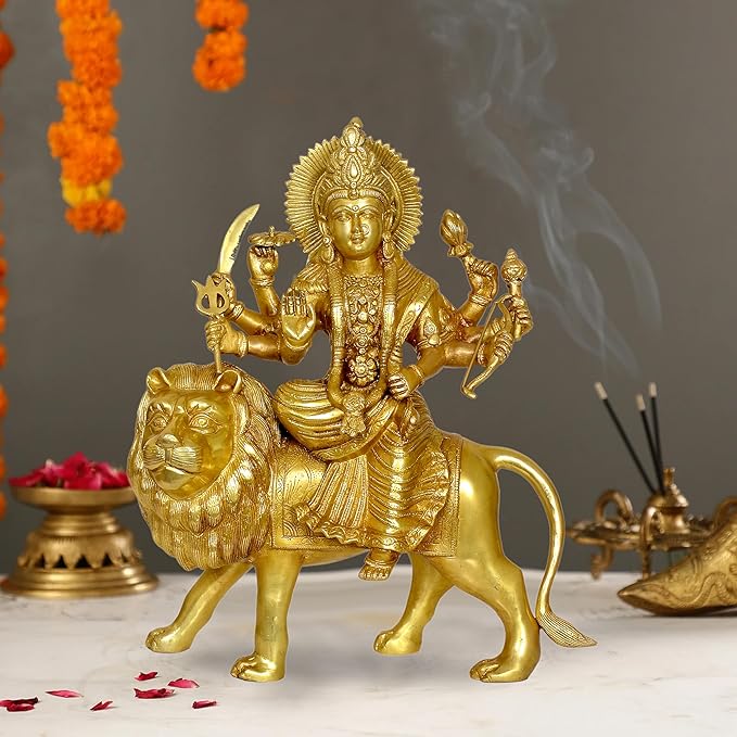 Brass Durga statue on lion, holding weapons, 18 in height