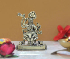 Brass Shreenathji Thakurji statue, 4 inch, angled view with raised arm and ornaments