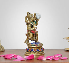 Brass Hanuman idol from back angle, teal sash and colorful jeweled pedestal base