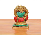 Brass multicolour panchmukhi Ganesha sitting murti, back view with red panels
