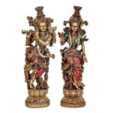 Radha Krishna resin statue pair, detailed full-body figures with raised hands on pedestals