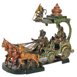 Brass chariot statue with Hanuman figure, decorated horses, and deity riders on chariot.