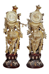 Brass Radha Krishna sculpture, rear view with circular halo discs and winged ornaments