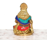 Brass Hanuman Ji sitting murti, back view, multicolor turban and garments