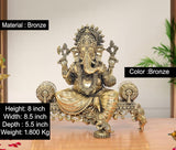 Bronze Ganesha idol on singhasan with detailed ornaments, 8-inch height