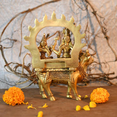 Brass Shiva Parvati idol on Nandi, rear view with halo arch and platform