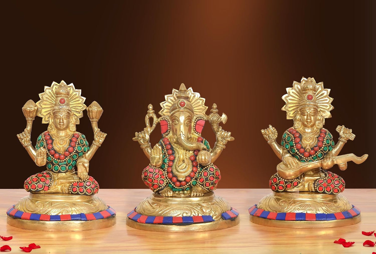 Brass Lakshmi Ganesh Saraswati idols with multicolor paint, seated on round bases