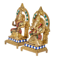 Brass Lakshmi-Ganesh idol figures, two seated deities with colorful bead details