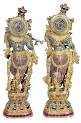 Brass Radha Krishna statue rear view, circular back detailing and jeweled legs