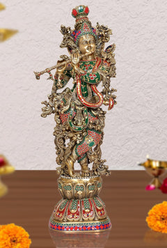 Brass Krishna sculpture, detailed standing figure with colorful green and red attire