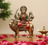 6-inch brass Goddess Sherawali murti seated on lion with weapons, multicolor detailing