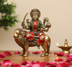 6-inch brass Goddess Sherawali murti seated on lion with weapons, multicolor detailing