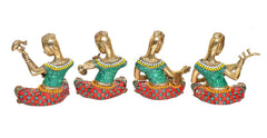 Four brass seated musician lady statues, varied instruments, teal attire, colorful bases