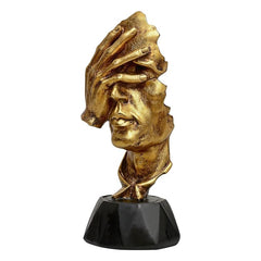 Gold polyresin face bust with headscarf detail, black pedestal base, angled view