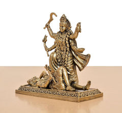 Brass Mahakaali with Shivji idol, 4-inch tall, side view of seated figure and base