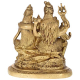 Back view of Shiva family brass figurine with draped figures and detailed textures
